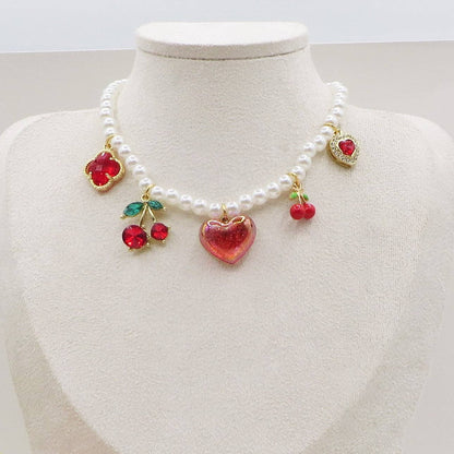 CHERRIES SHINE - Pearl necklace and cherry charms